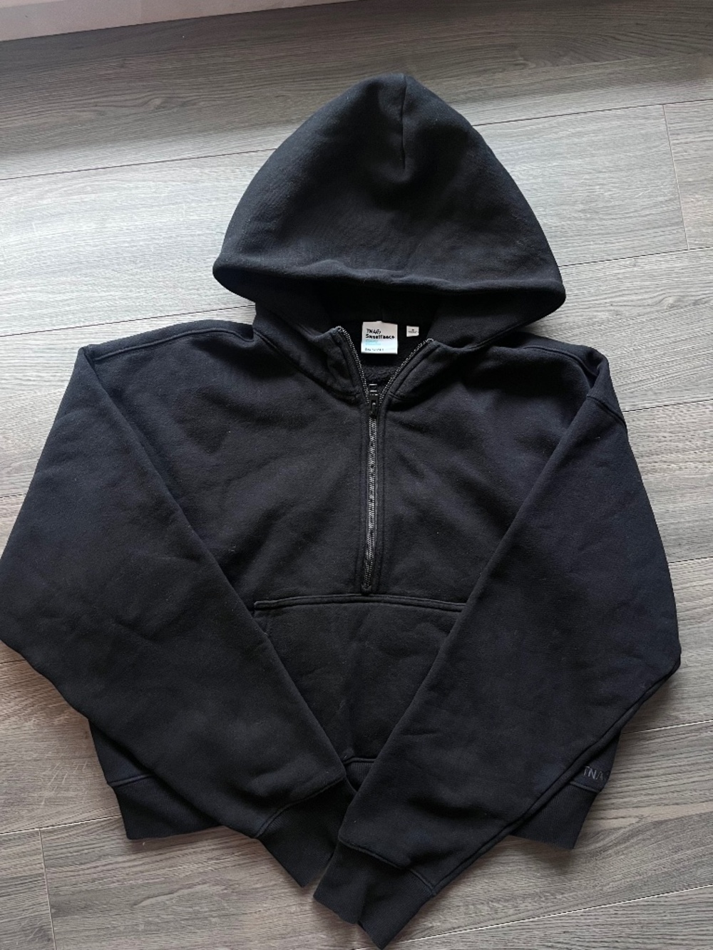 aritzia tna cozy fleece boyfriend fit black 1/2 zip hoodie